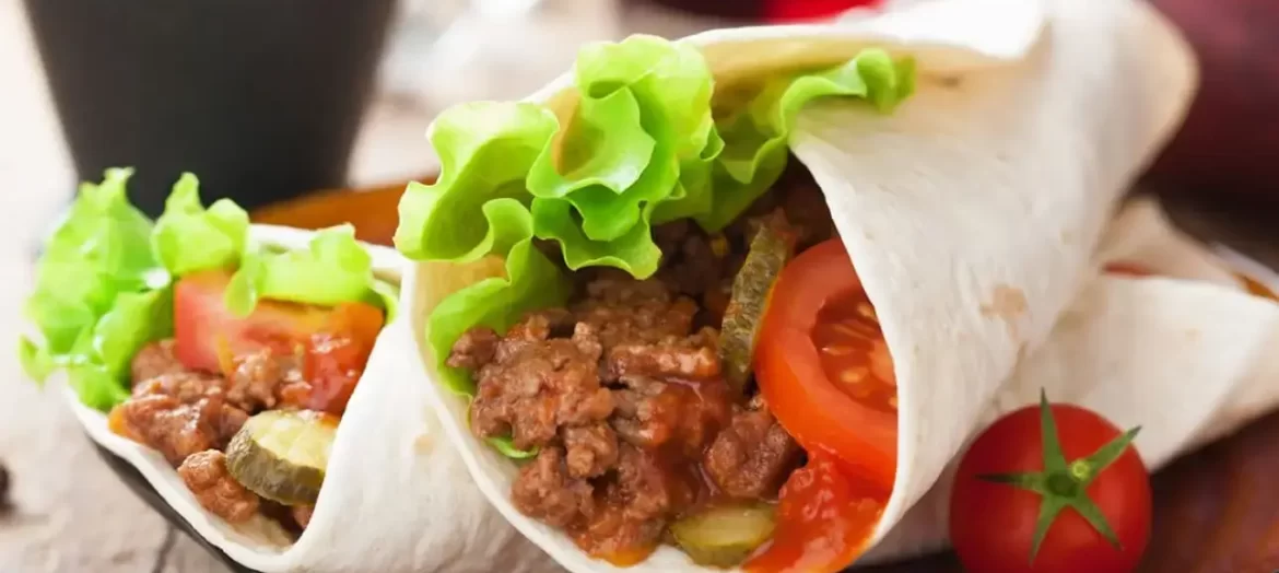 Hamburger Burrito With Lettuce, Pickles And Tomato