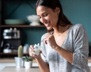 Woman Eating Plant-Based Yogurt